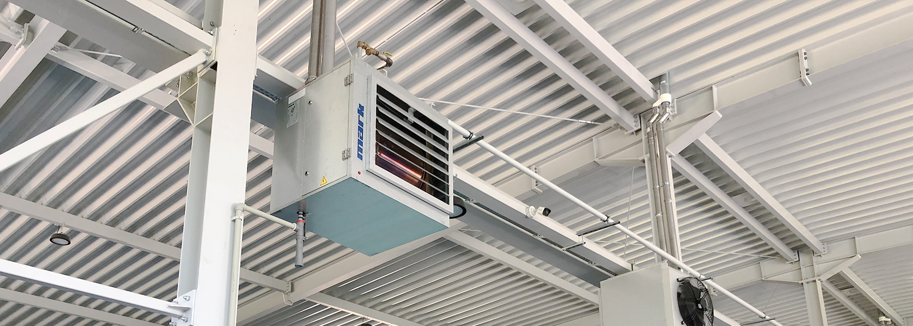 Mark GS+ HE air heaters hanging in the room